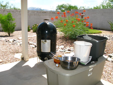 Man bliss: smoker, mop, wood chips, extra charcoal