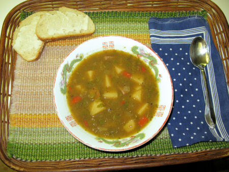 New Mexico stew (in a Chinese bowl . . . with French bread)