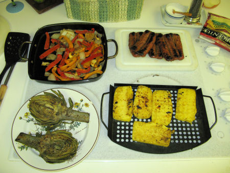 Clockwise from upper left: peppers & onions, sausage, polenta, artichoke