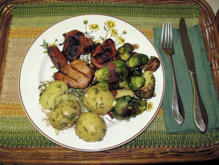 Jerk pork medallions w/potatoes & Brussels sprouts